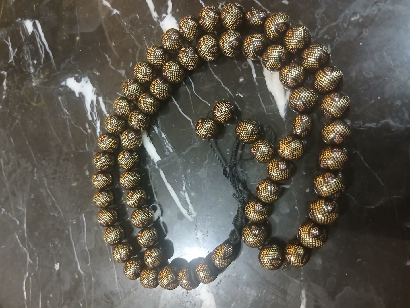 تسبیح مسکوبی برنج کوبی شده کار دست 